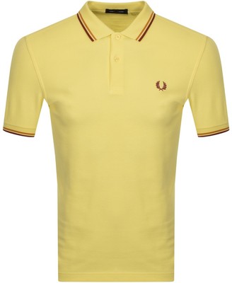 fred perry yellow polo shirt